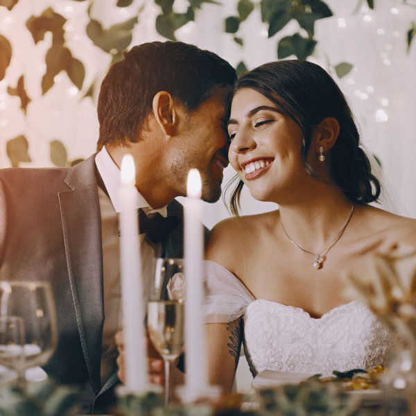 bride and groom smiling